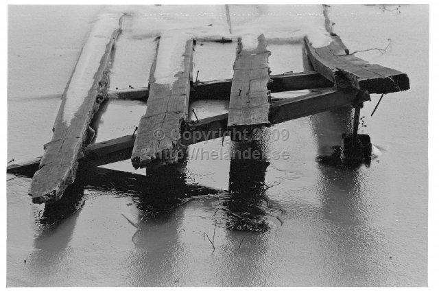 Old bridge in the ice. (1973)