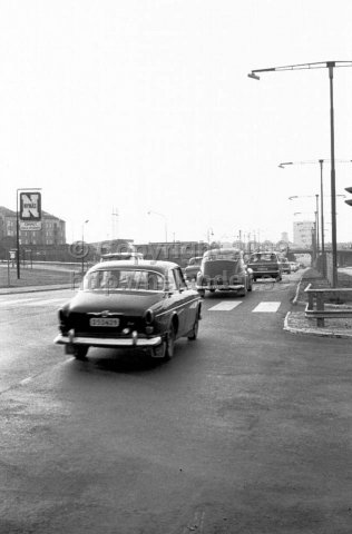 Nynäsvägen northbound towards Gullmarsplan. The Globen arena is to the left today. Stockholm. (1966)