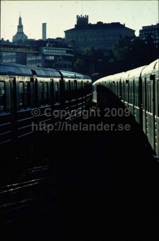 Two metro trains (tunnelbana) at Gamla stan metro station facing Södermalm, Stockholm. (1972)