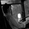 Bus driver (Stefan Helander) driving a SL-bus, Stockholm. (1987)